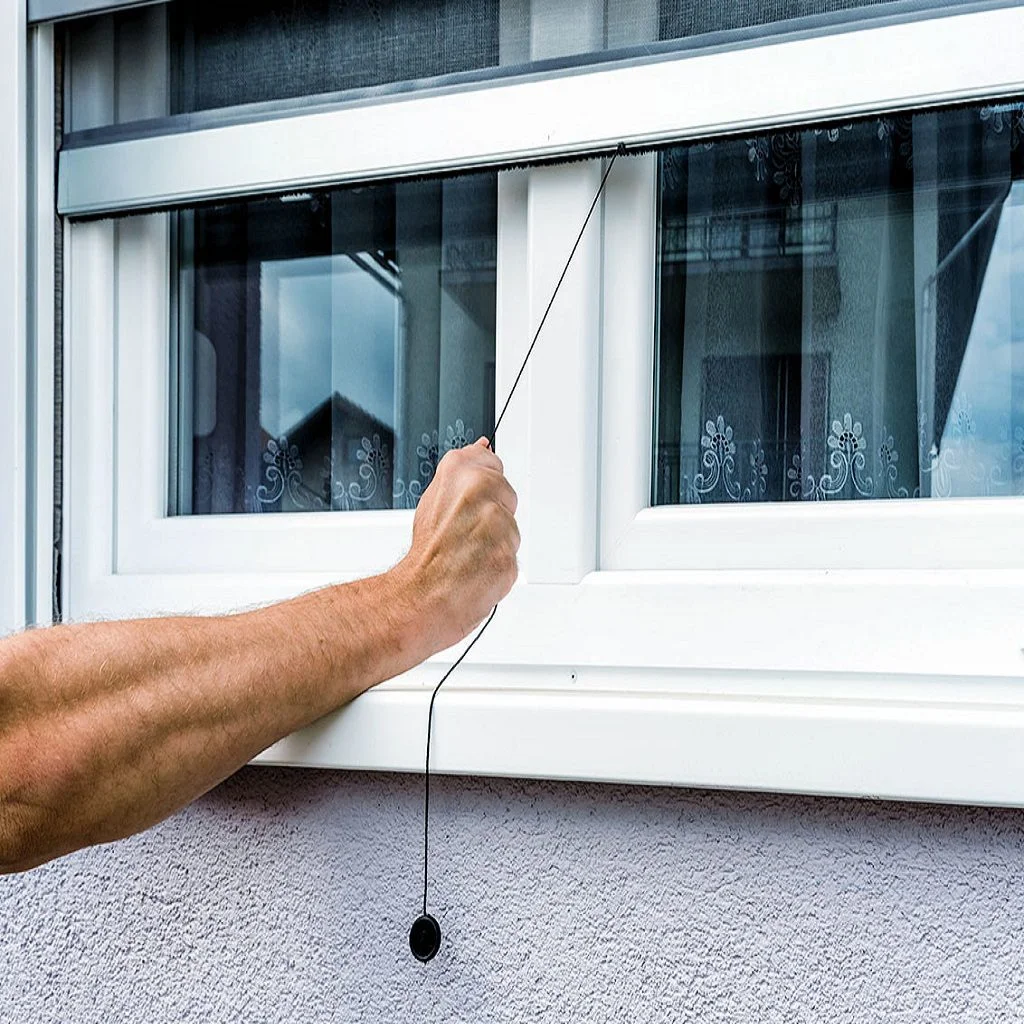 Close-up of stainless steel invisible grill cables with anchor fittings