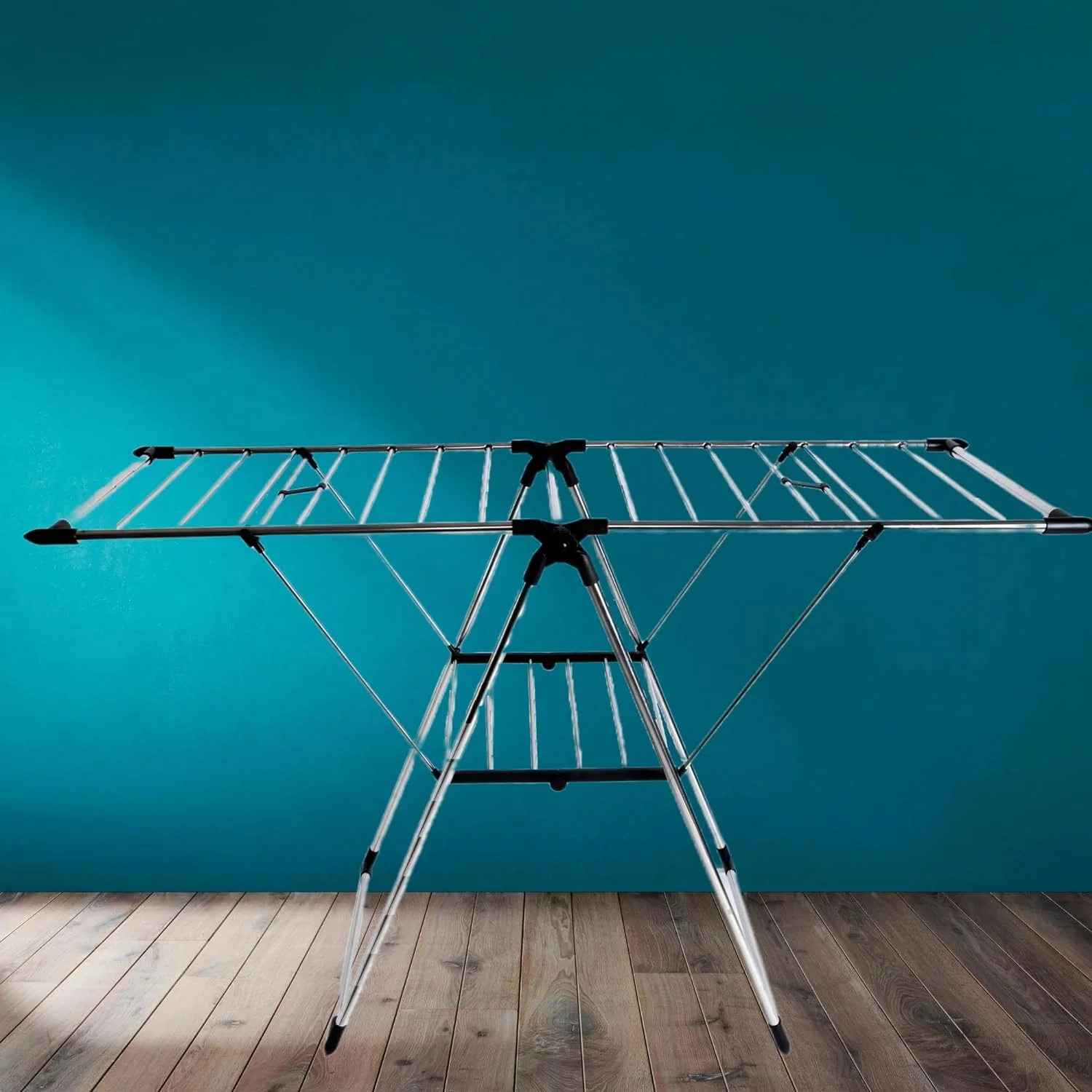 Wall-mounted foldable cloth drying stand on an apartment balcony